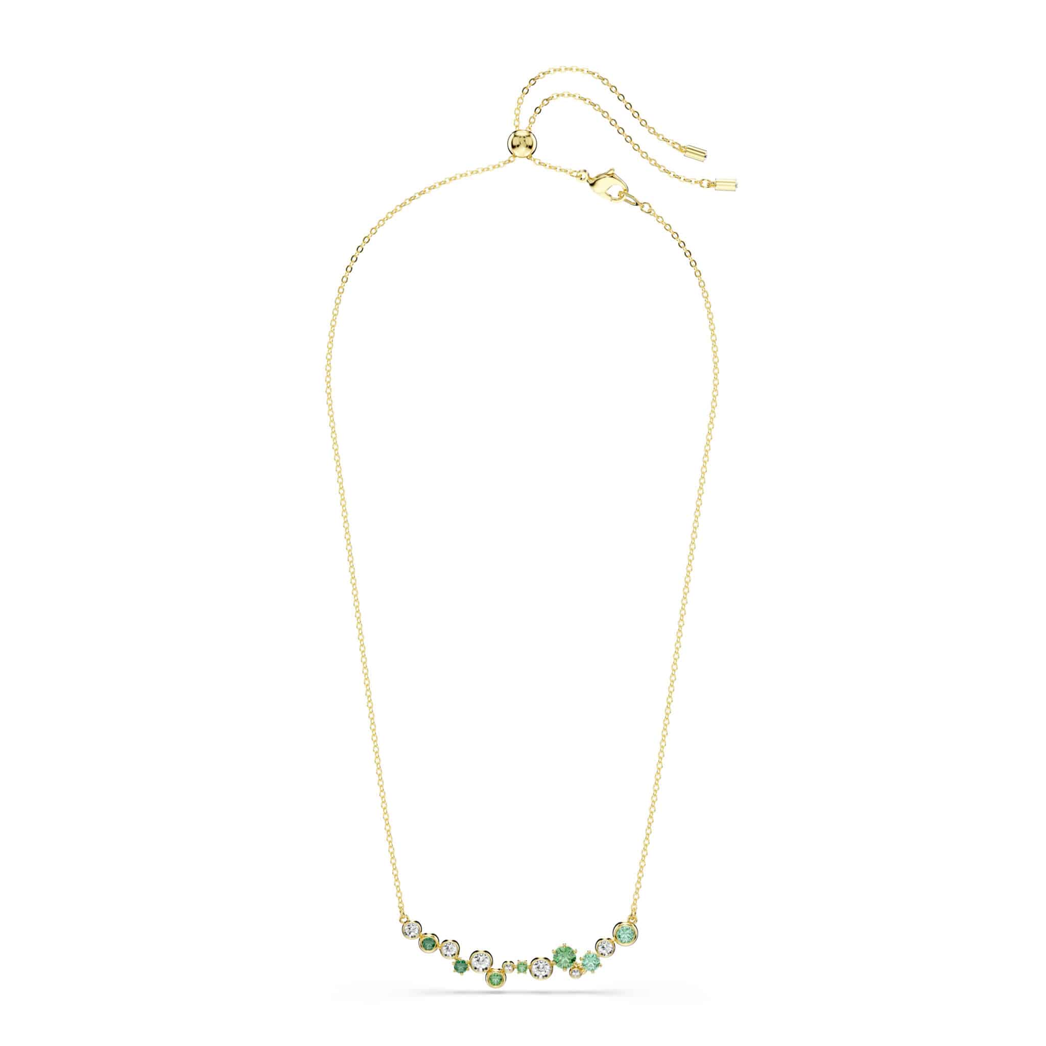 Swarovski Constella necklace with green mixed-cut crystals and gold-tone plating on a delicate chain.