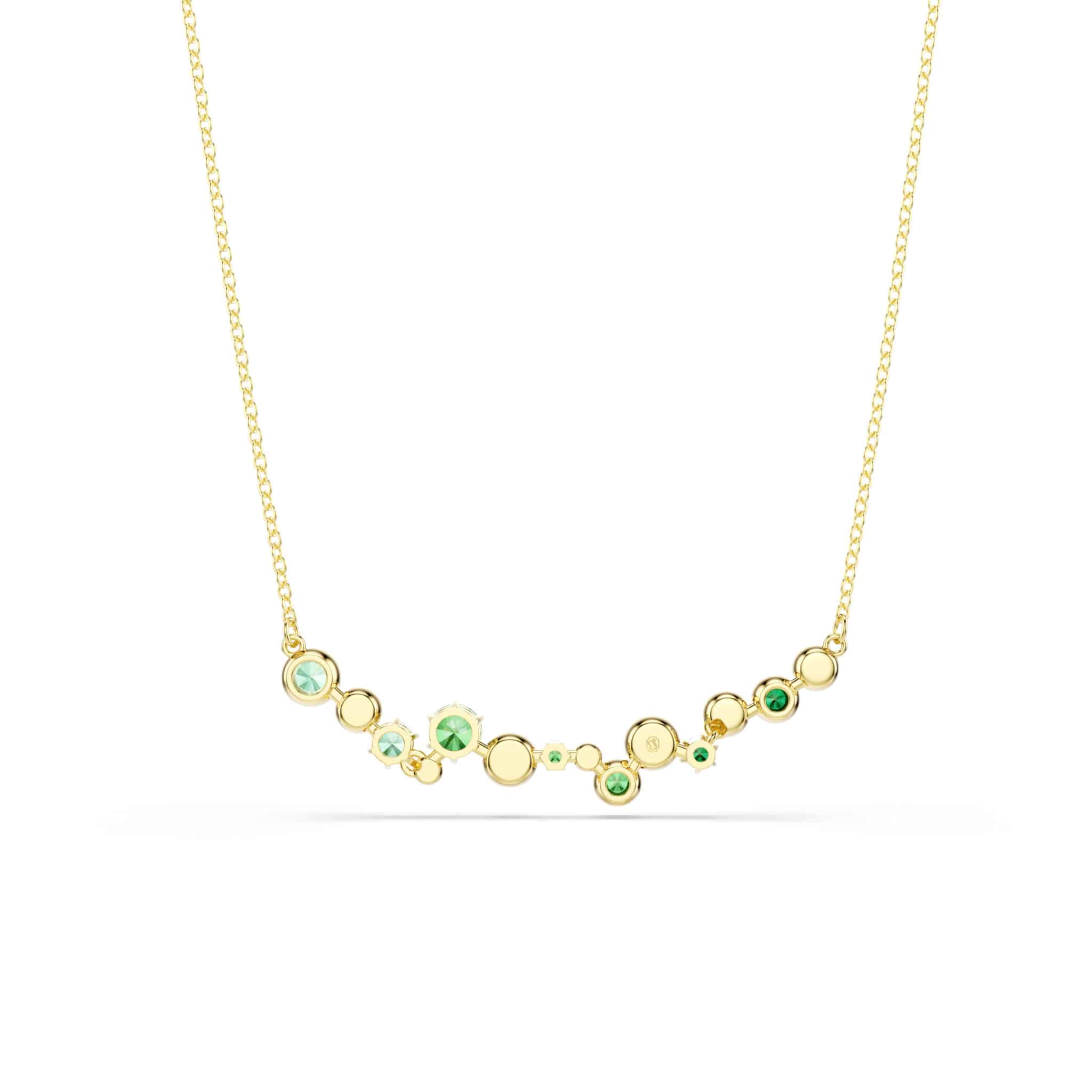 Swarovski Constella necklace with mixed cut green crystals and gold-tone plating, showcasing elegant jewelry design.