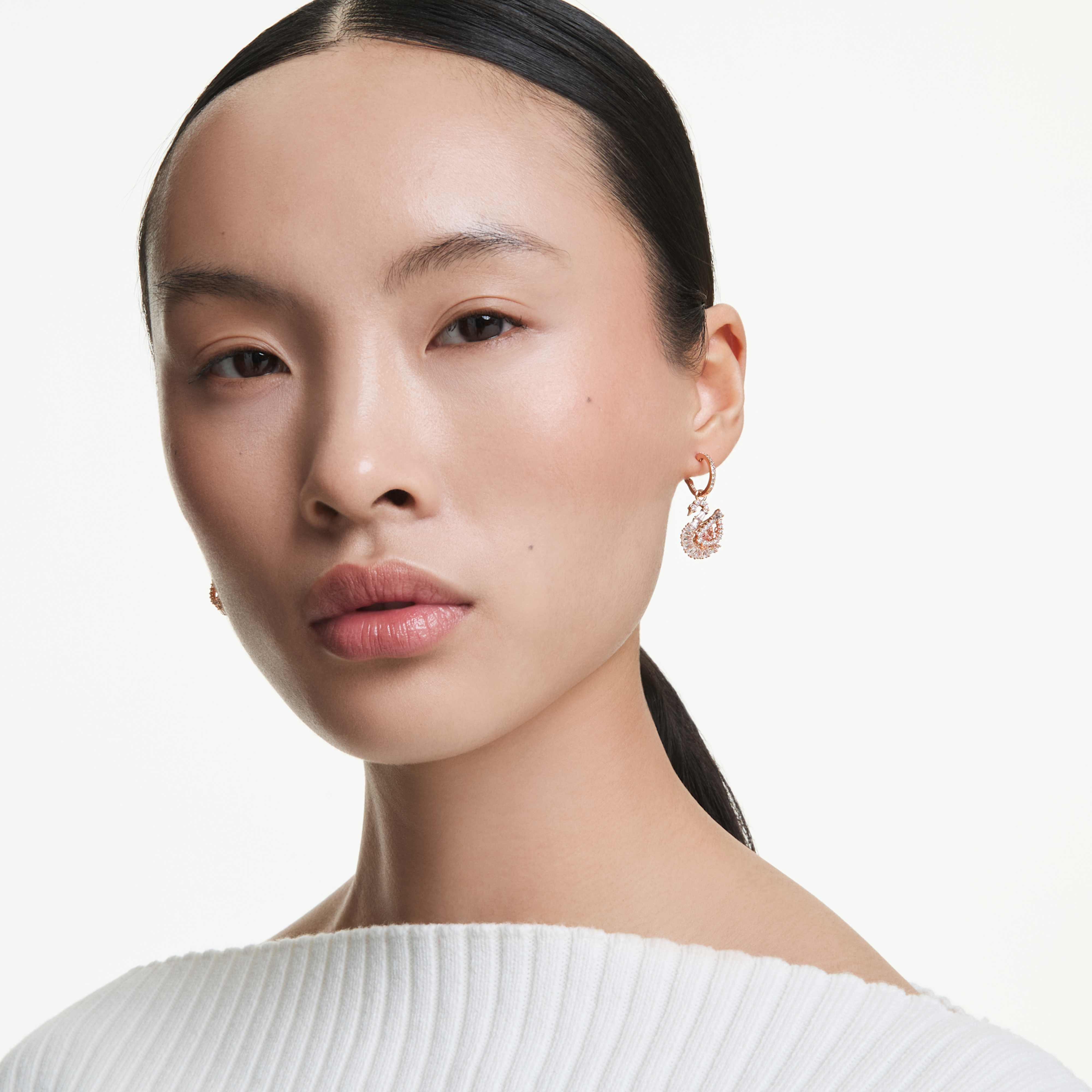 Swarovski Swan Drop Earrings with pink pavé crystal accents and elegant swan design, showcasing sparkling jewelry craftsmanship.