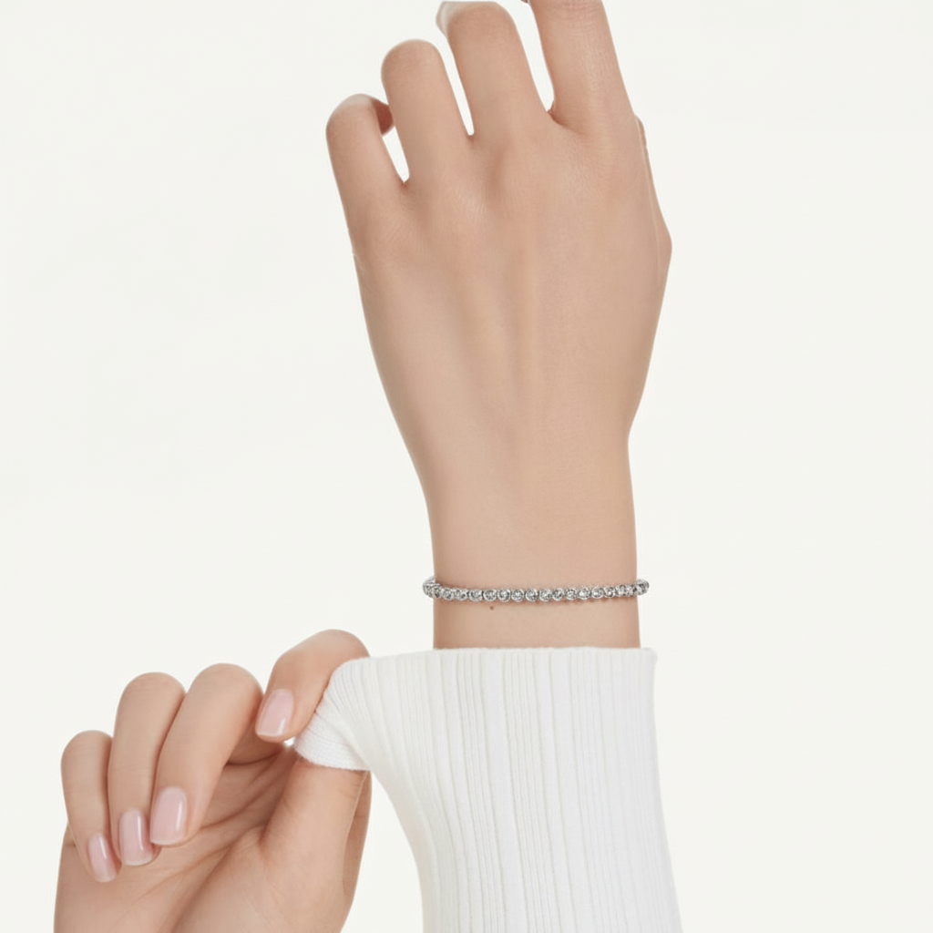 Swarovski Imber Emily tennis bracelet with round cut crystals and silver-tone setting, elegant jewelry accessory.