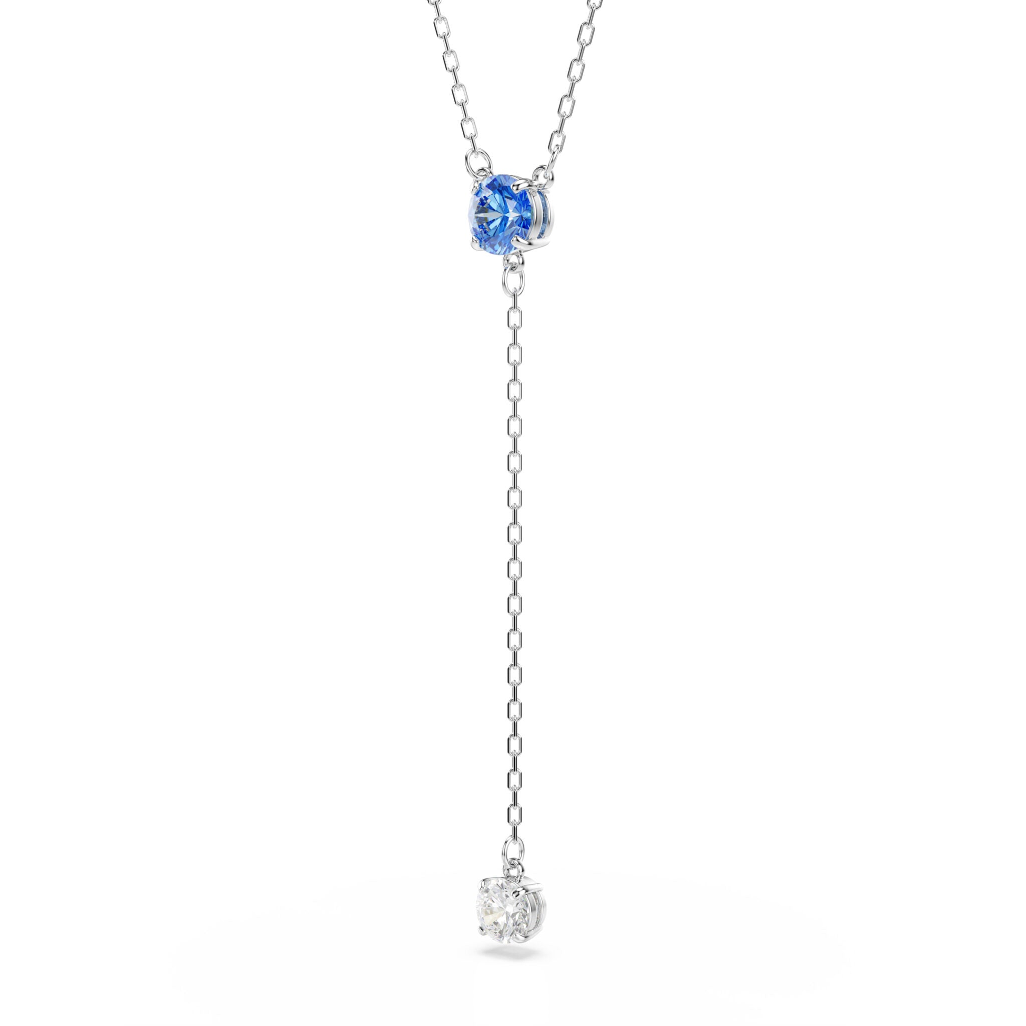Swarovski Stilla Necklace with blue crystals and rhodium plating, featuring a delicate chain and elegant pendant design.