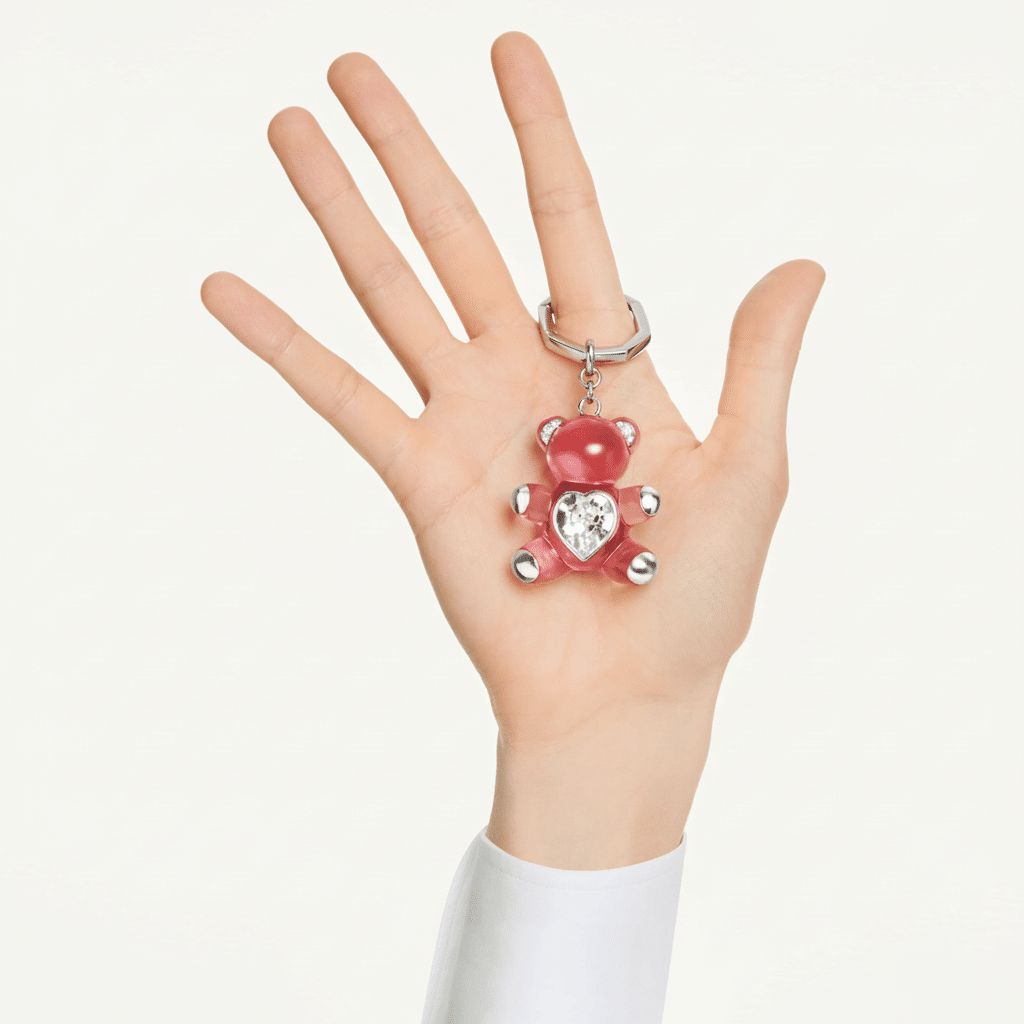 Pink Swarovski Teddy bear key ring with rhodium plating, featuring a detailed, sparkling bear design for keychain or accessory use.