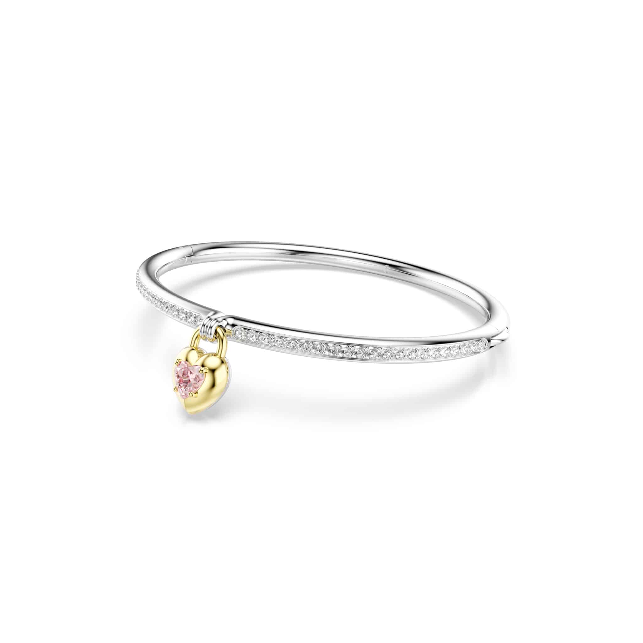 Swarovski Idyllia pink bangle with mixed metal finish and heart-shaped crystal cuts, featuring sparkling pink and clear stones.