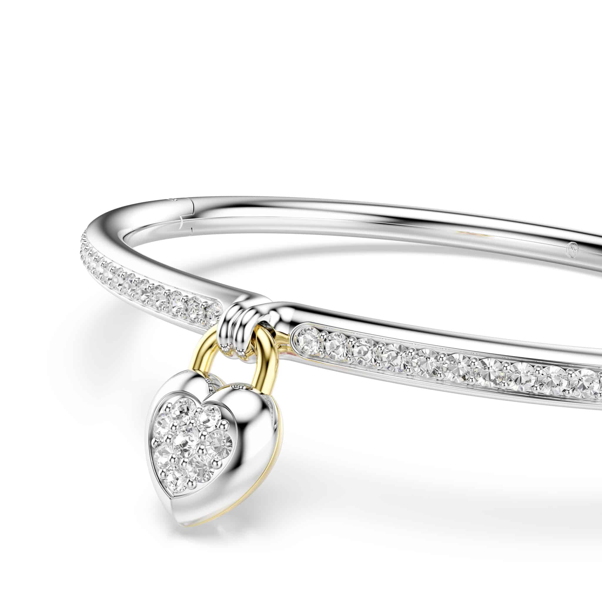 Swarovski Idyllia bangle with pink heart charm, mixed metal finish, featuring mixed cuts and sparkling crystal details.