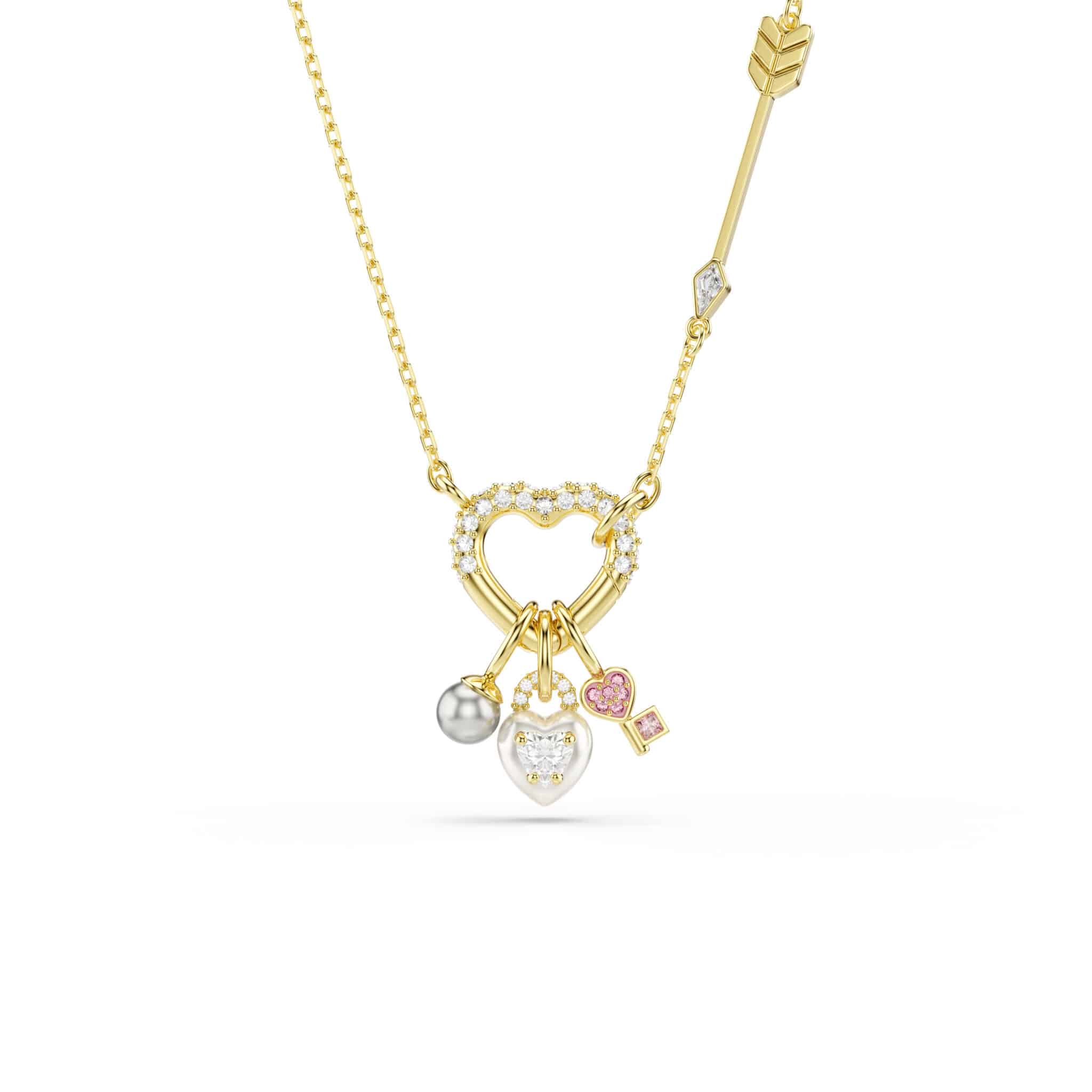Swarovski Idyllia pendant with pink heart and key charms, mixed cuts, gold-tone plated jewelry accessory.