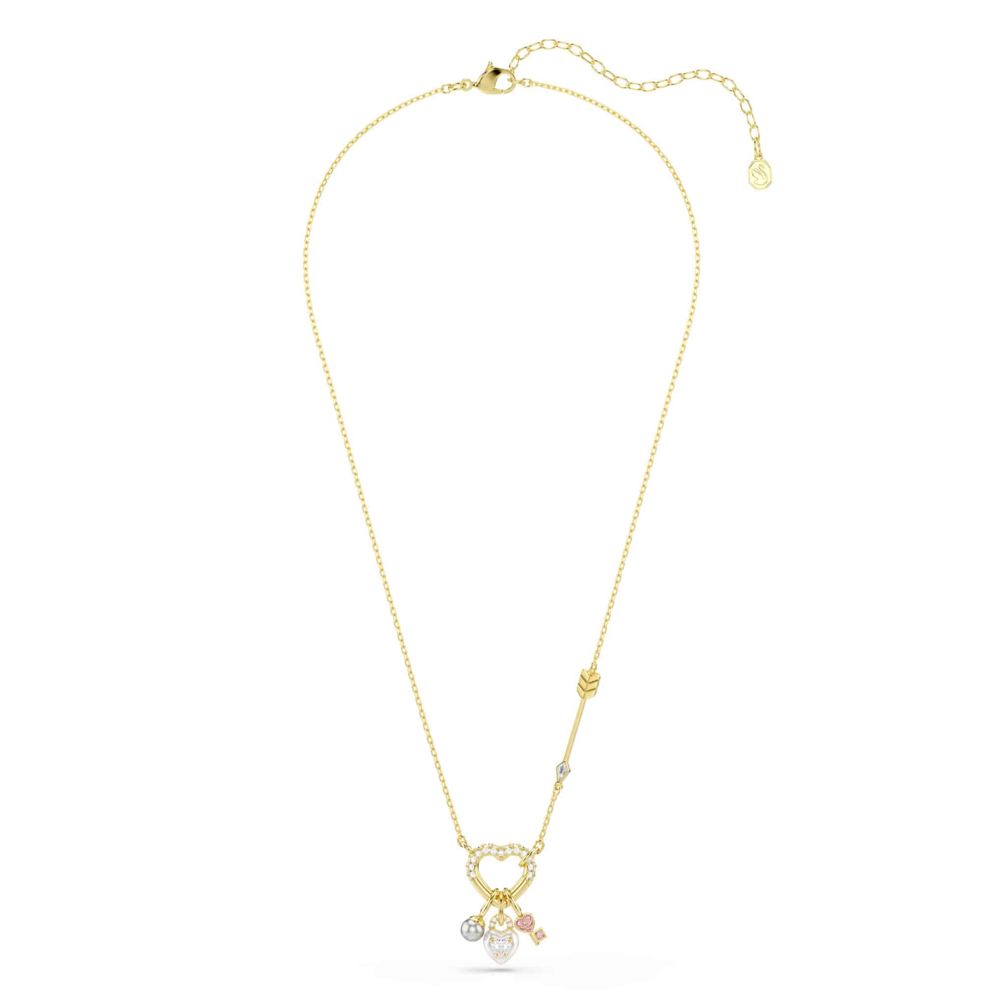 Swarovski Idyllia pendant with mixed cuts in heart and key shapes, pink stones, gold-tone plated jewelry.