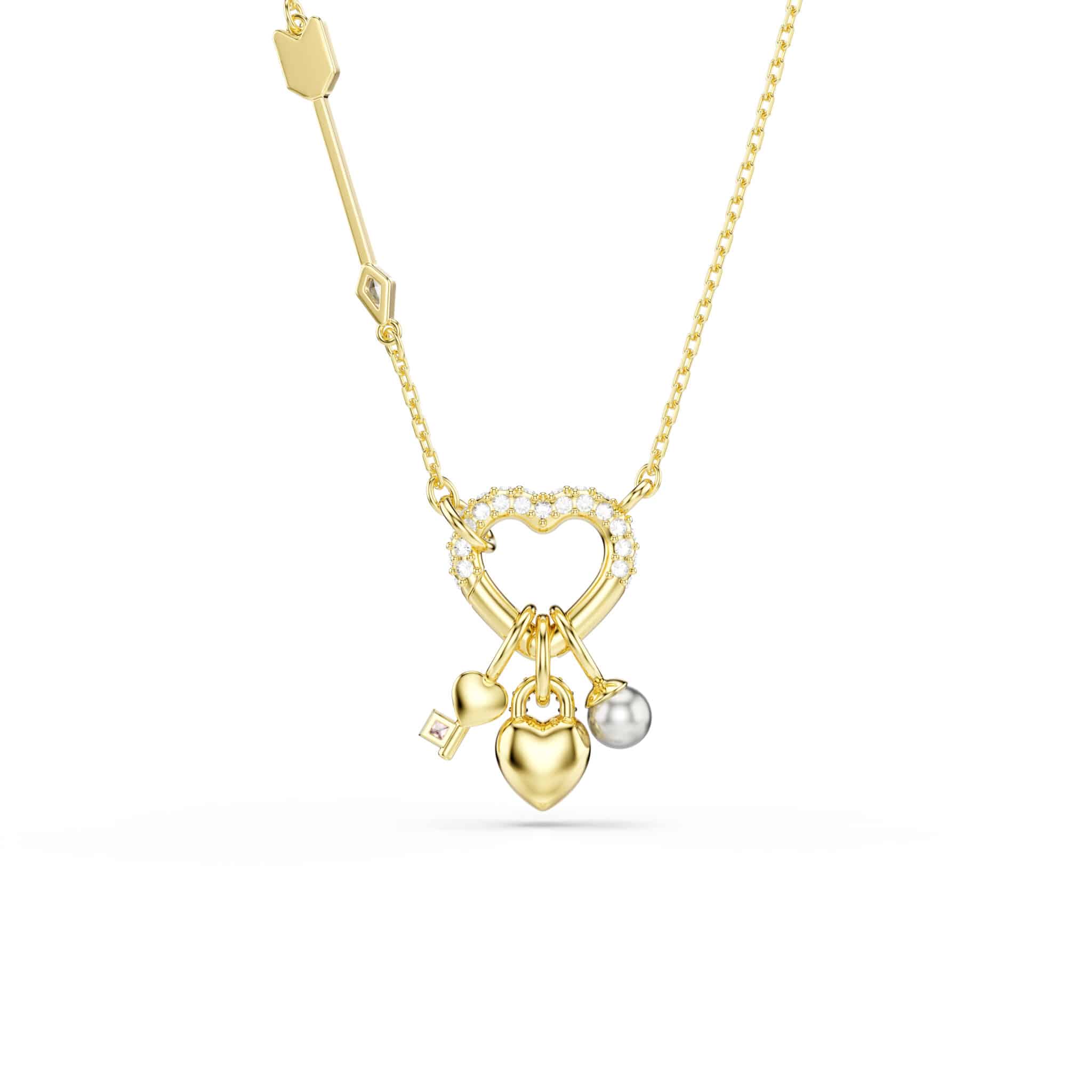 Swarovski Idyllia pendant featuring mixed-cut heart and key shapes in pink with gold-tone plating.