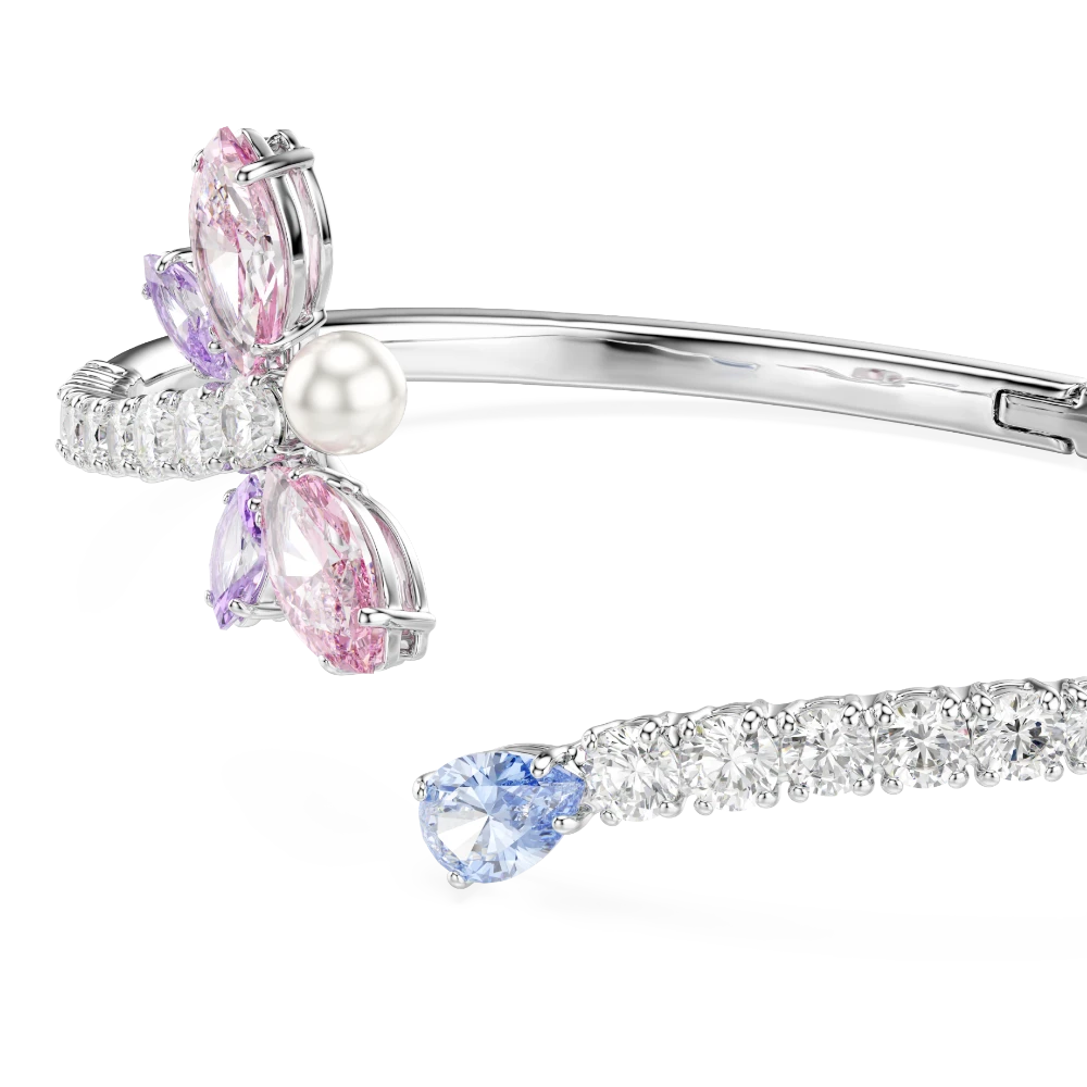 Swarovski Ariana Grande bangle with multicolored dragonfly design, mixed cuts, rhodium-plated jewelry accessory.