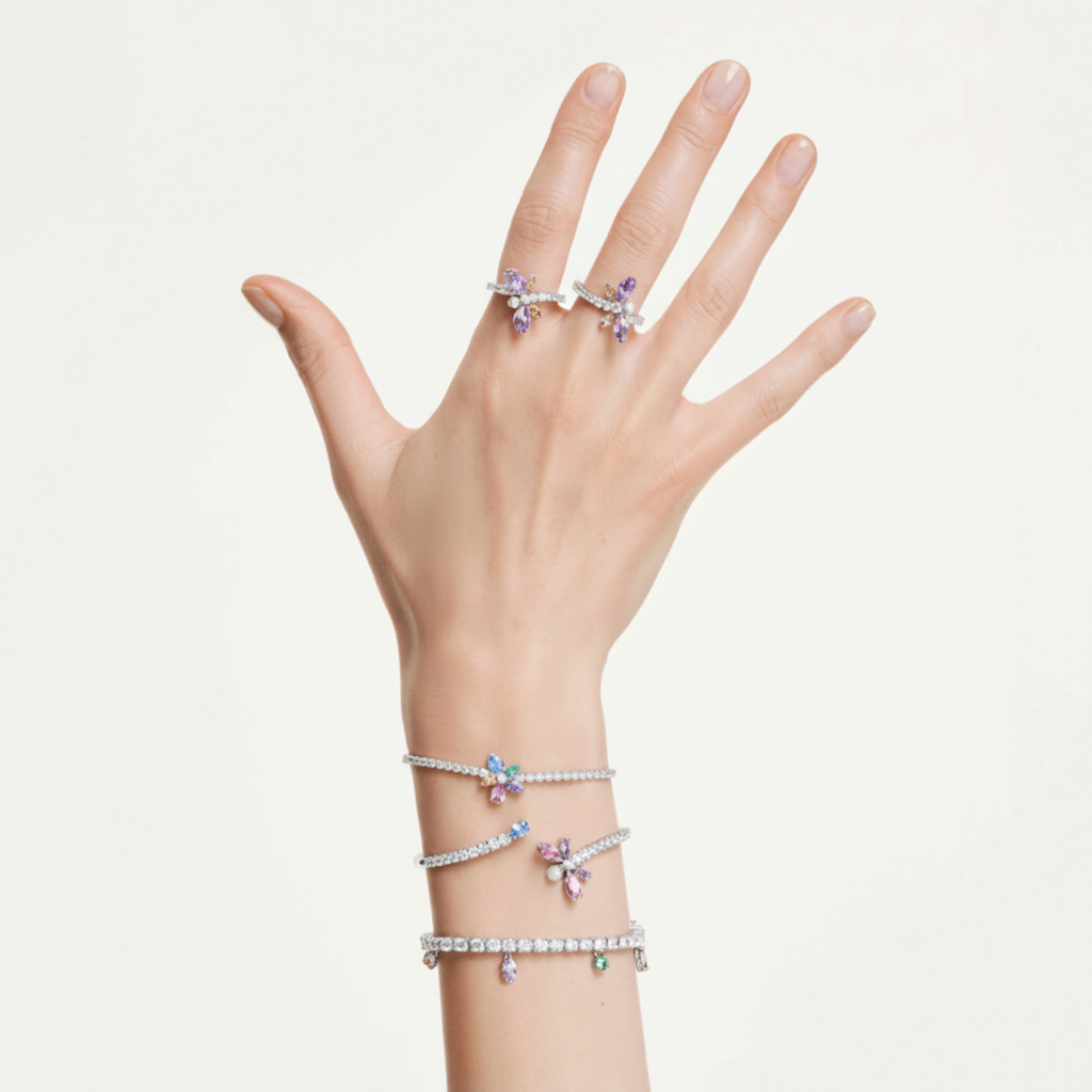 Swarovski Ariana Grande x Swarovski dragonfly bangle with multicolored mixed cuts and rhodium plating, detailed jewelry accessory.