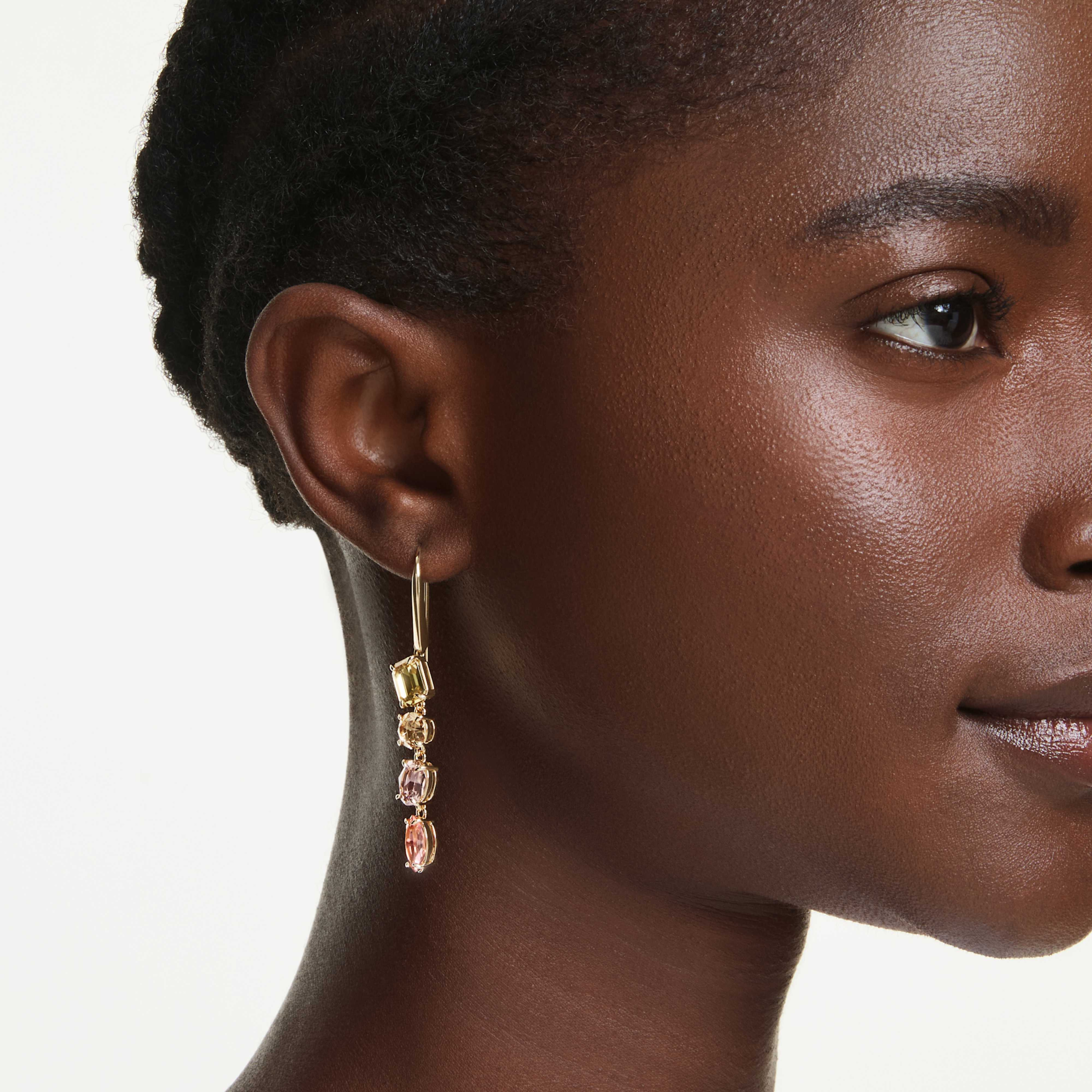 Swarovski Gema Drop Earrings with asymmetrical design, pink crystals, mixed cuts, gold-tone plating, elegant jewelry accessory