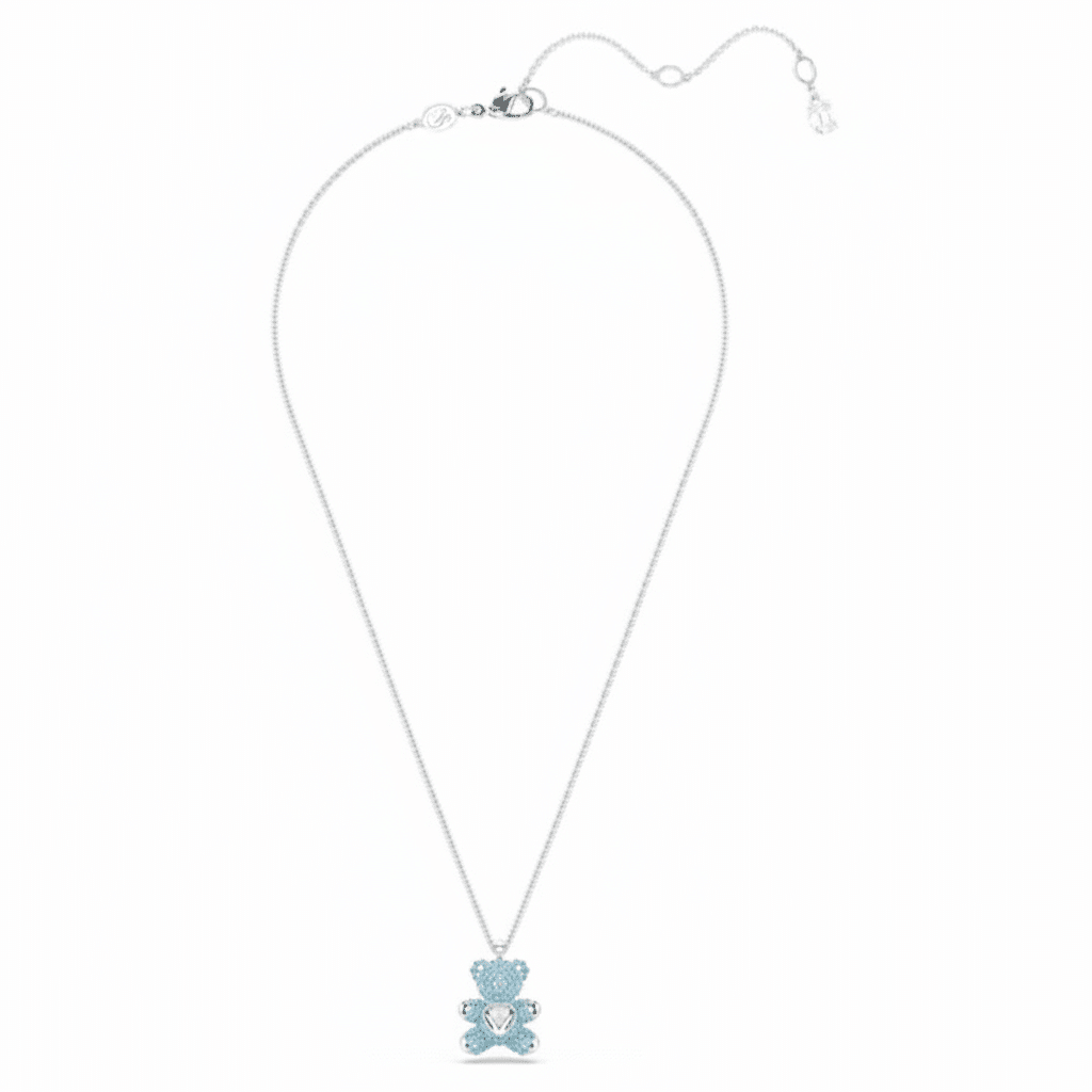 Swarovski Teddy pendant bear in blue with rhodium plating, detailed crystal craftsmanship, elegant jewelry accessory