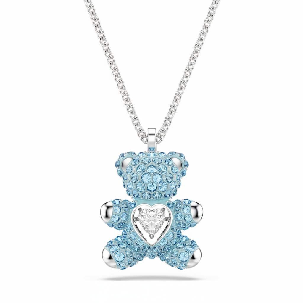 Swarovski Teddy pendant Bear in blue with rhodium plating, featuring sparkling crystal details and a delicate chain.