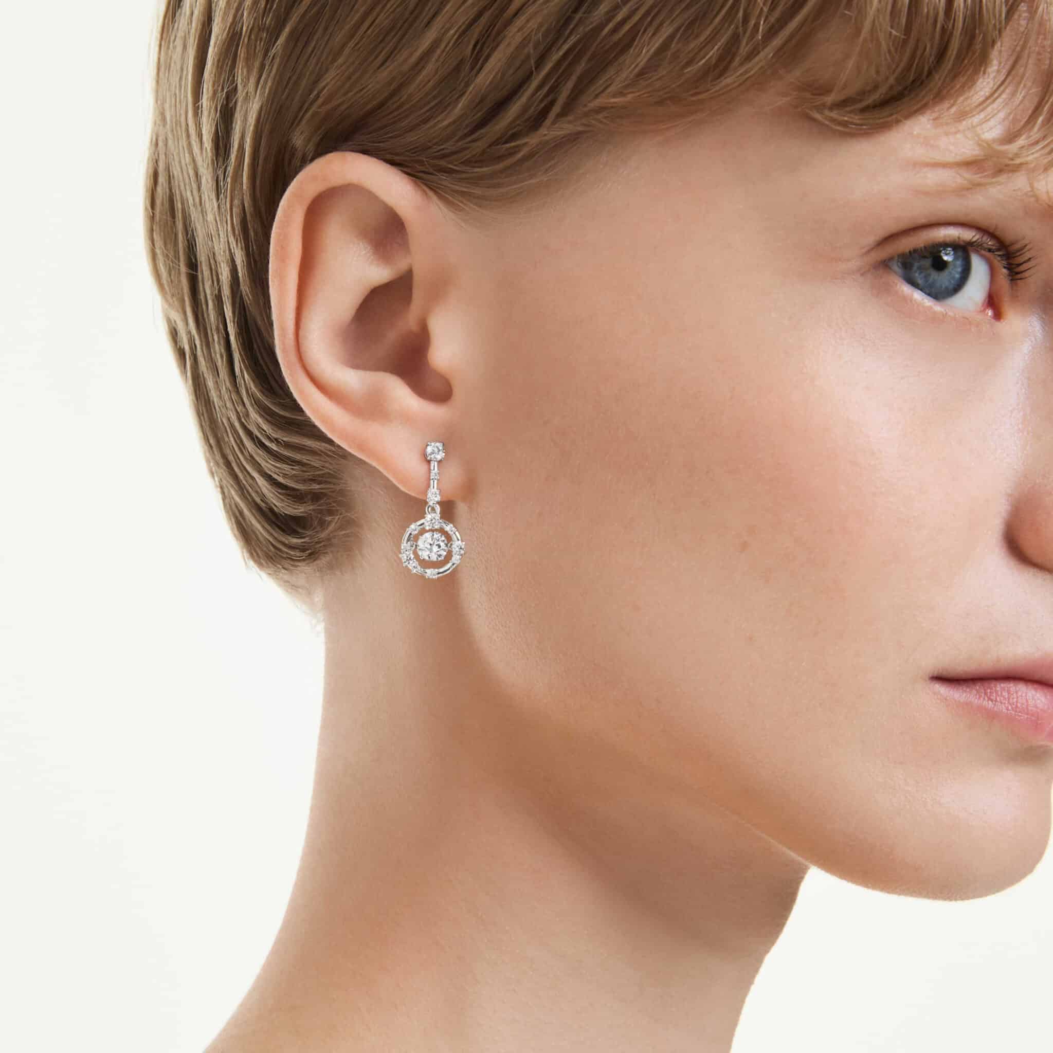 Swarovski Constella drop earrings with round cut dancing stones, white crystals, rhodium plating, elegant jewelry accessory