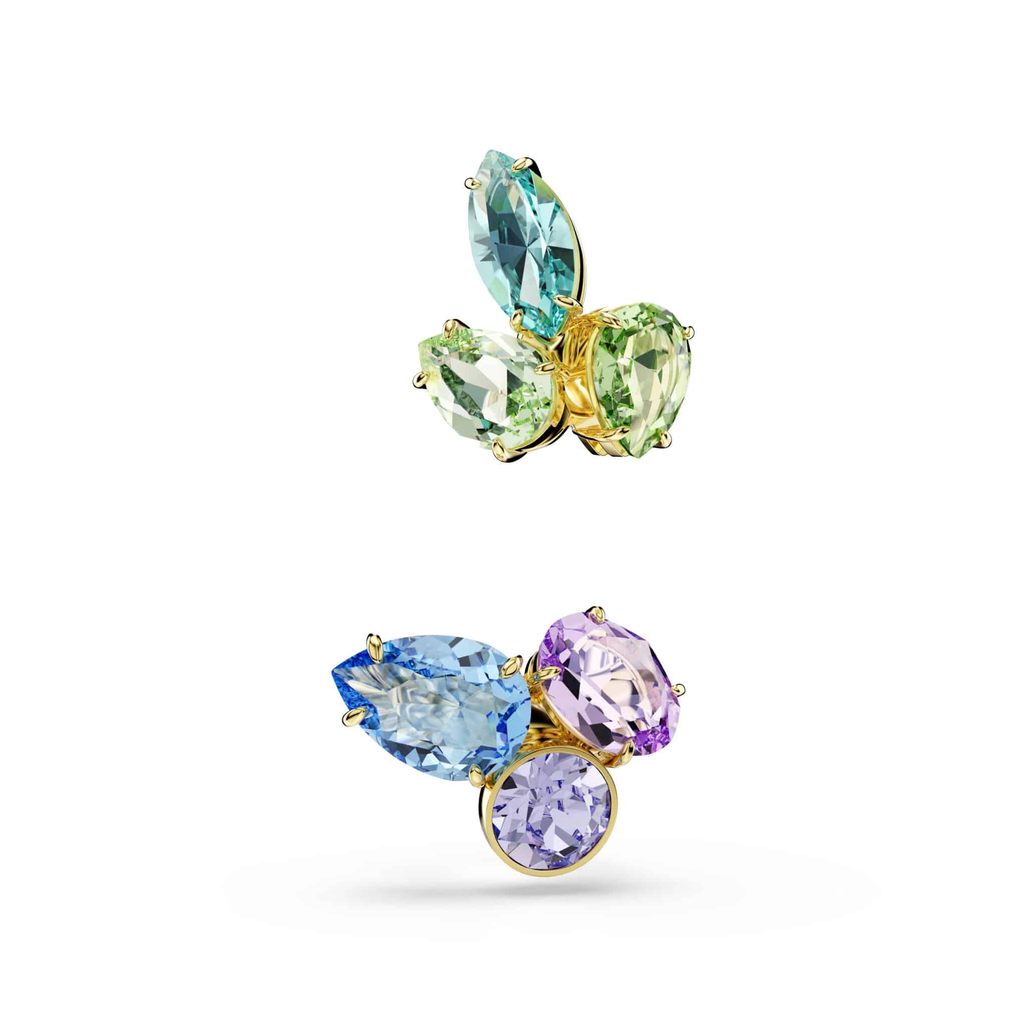 Swarovski Gema ear cuffs with asymmetrical design, multicolored mixed cuts, gold-tone plating, and sparkling crystal details.