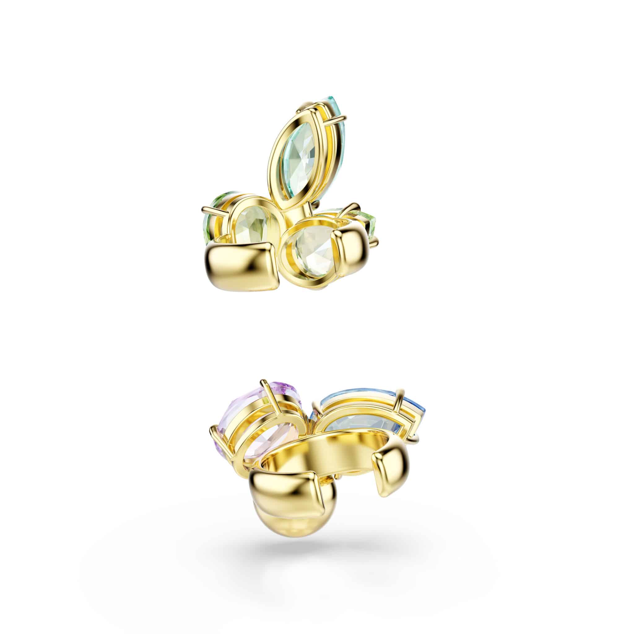 Swarovski Gema ear cuffs with asymmetrical design, multicolored crystals, and gold-tone plating.