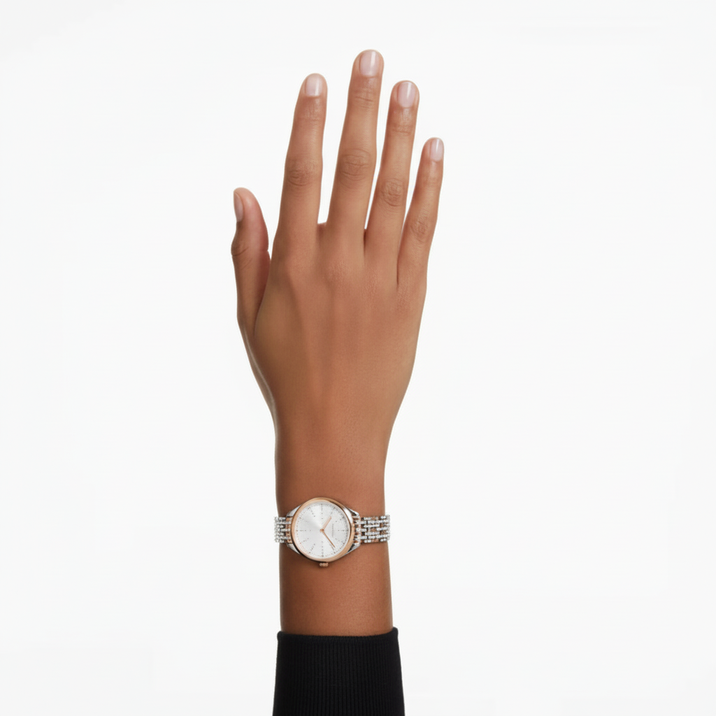 Swarovski Attract Swiss Made watch with rose gold-tone metal bracelet and elegant round face, showcasing a luxurious jewelry design.