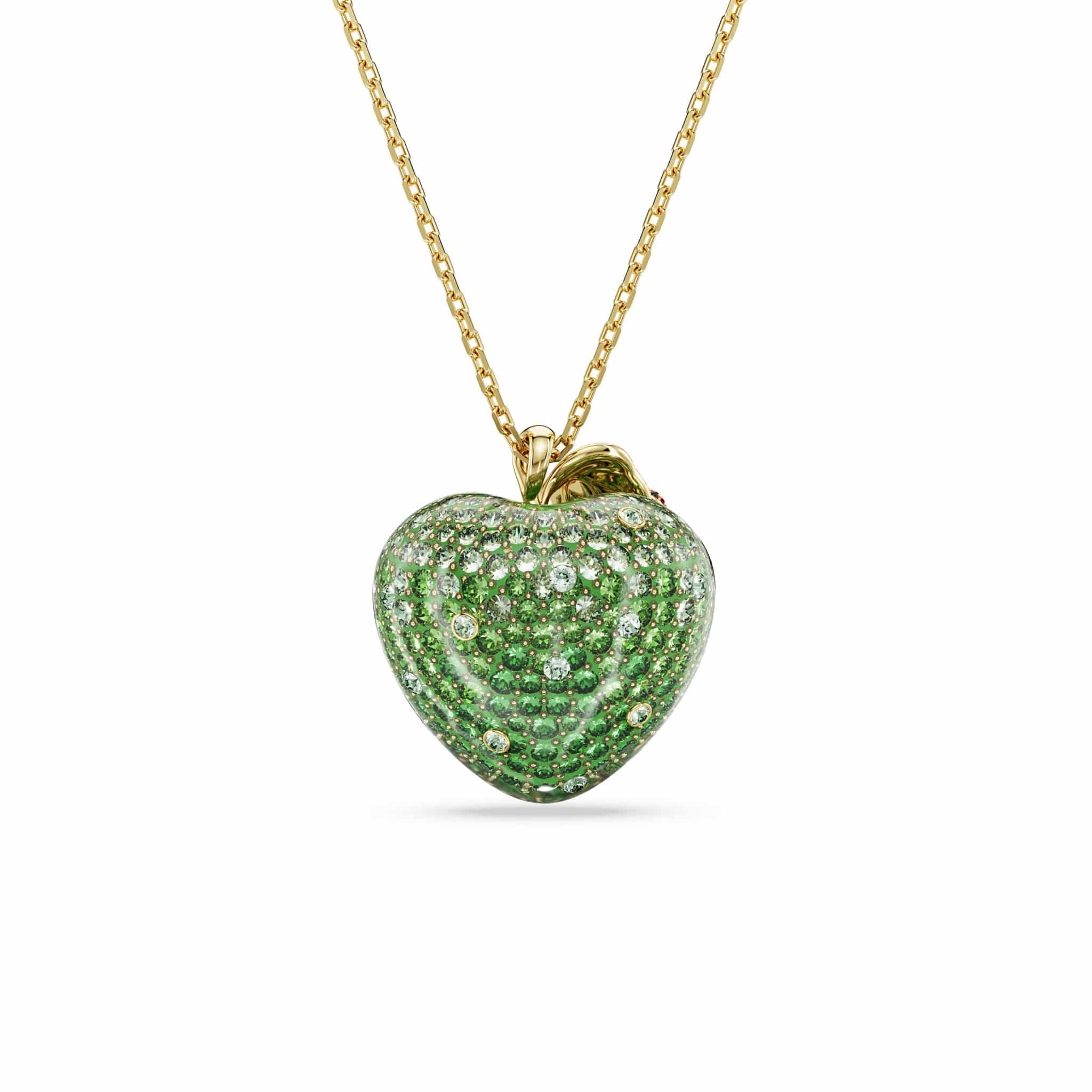 Swarovski Idyllia pendant featuring mixed-cut green apple-shaped crystal with gold-tone plating. Elegant jewelry accessory.