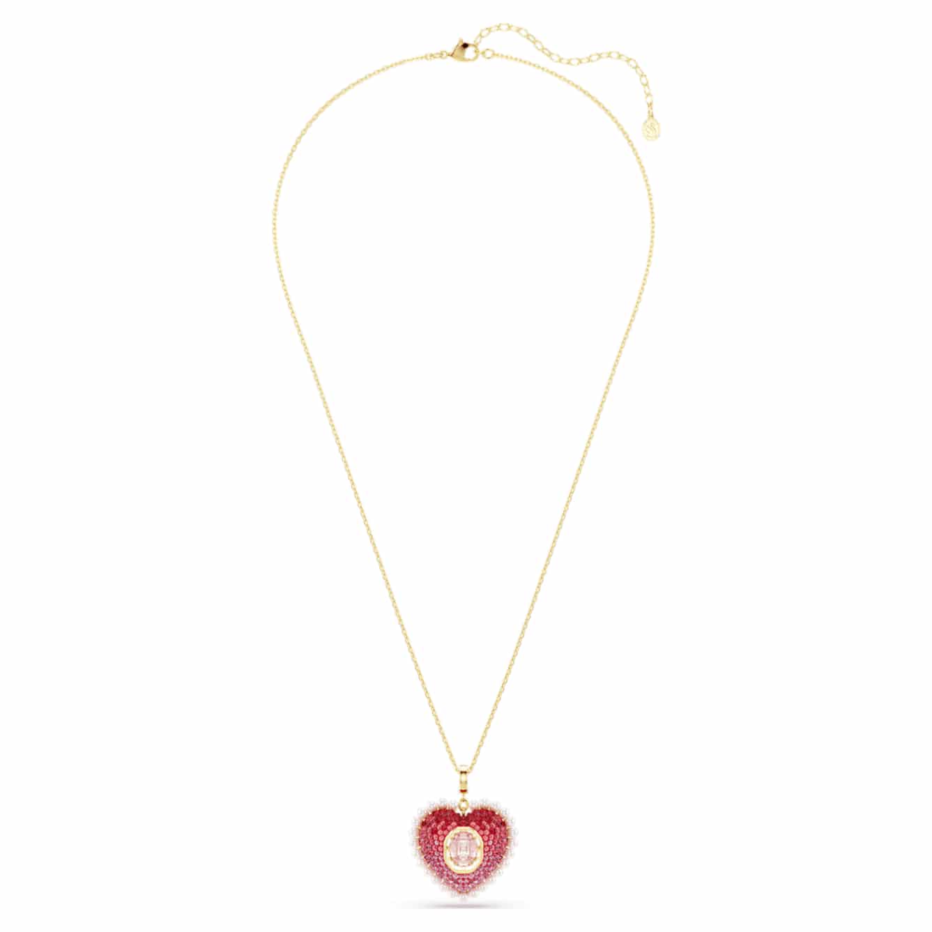 Swarovski Idyllia pendant with mixed-cut pink heart crystal, gold-tone plated, showcasing elegant jewelry design.