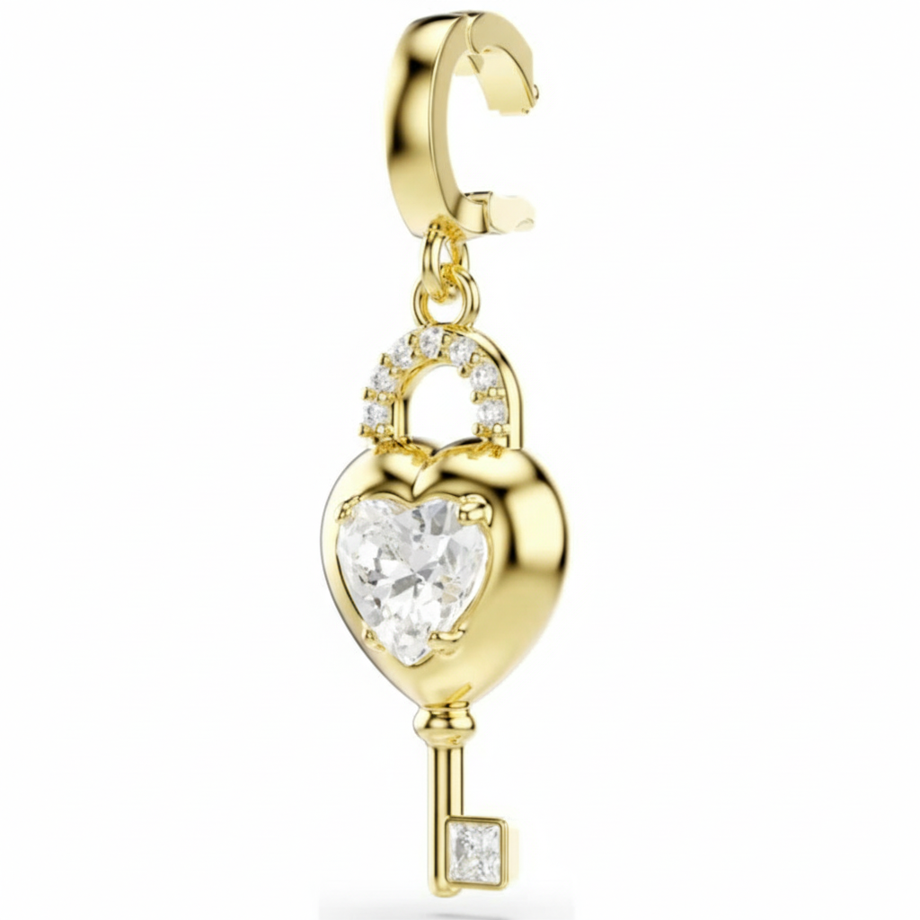 Swarovski Idyllia charm featuring a heart with a key design, mixed cuts, white crystal, gold-tone plated, jewelry accessory