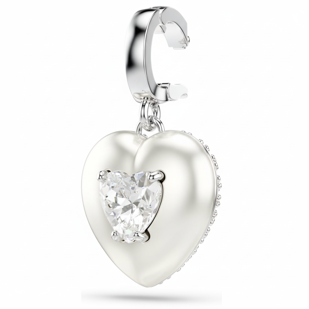 Swarovski Idyllia charm with sparkling crystal details, featuring a delicate silver-tone design and intricate craftsmanship.