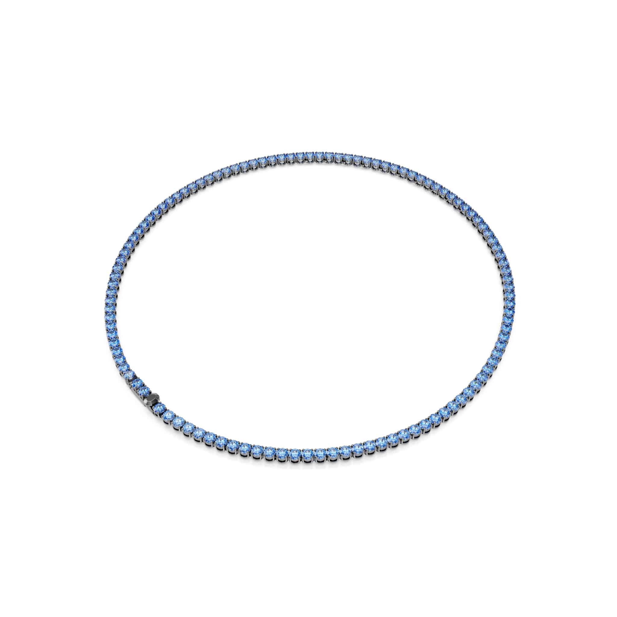 Swarovski Matrix tennis necklace with round blue crystals, ruthenium plated, elegant jewelry piece on a display background.