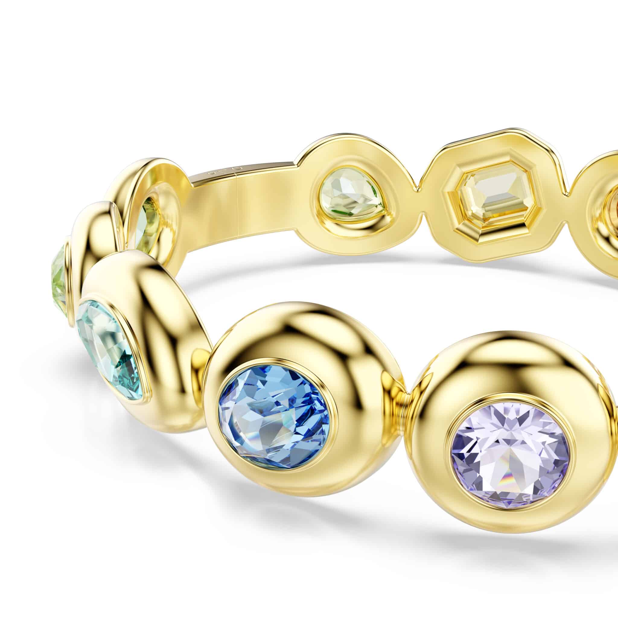 Swarovski Gema Bangle featuring sparkling crystal embellishments and a sleek silver-tone design on a white background.