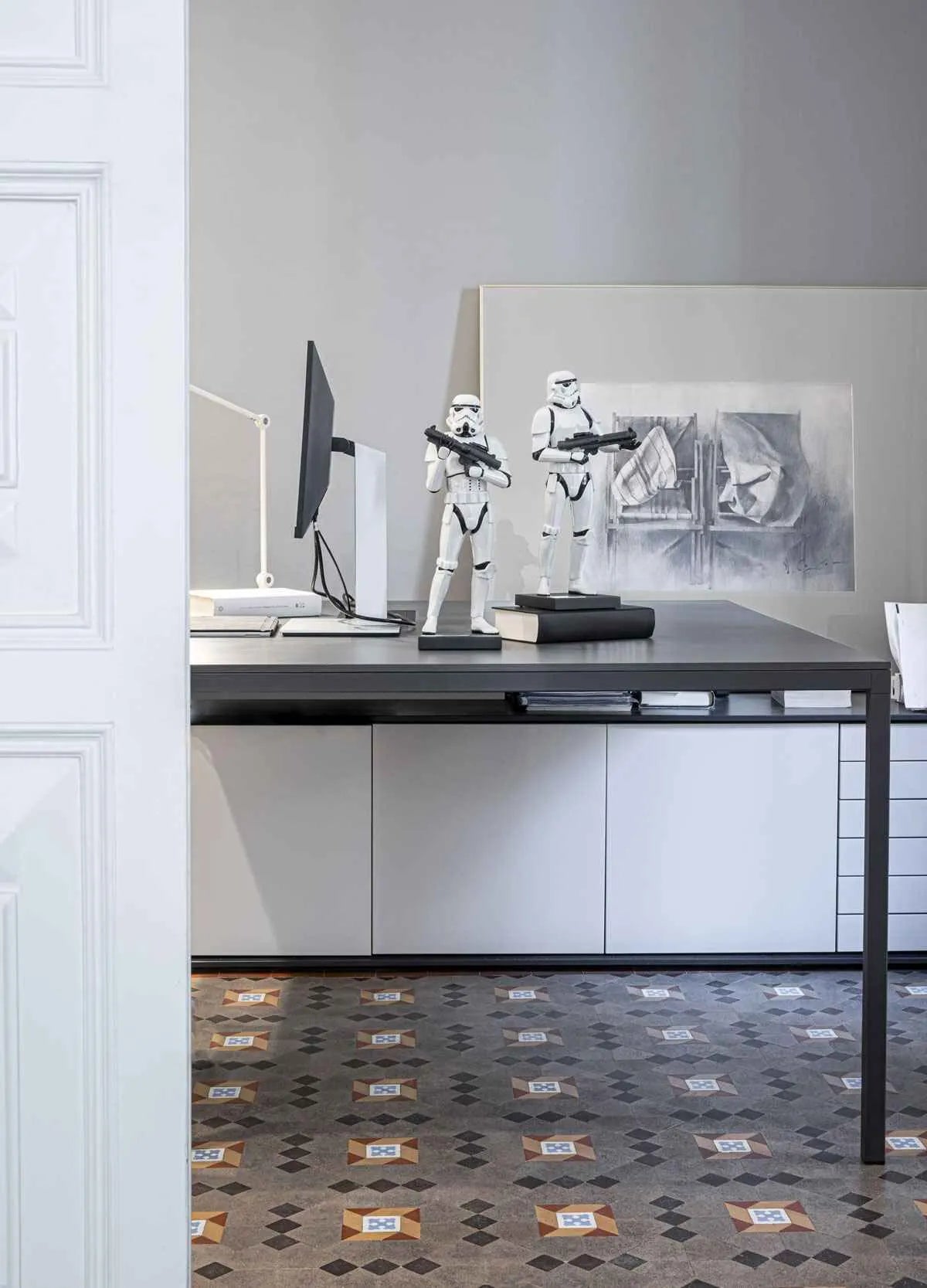 Lladro Stormtrooper™ sculpture, limited edition collectible figure with detailed white ceramic design and black accents.