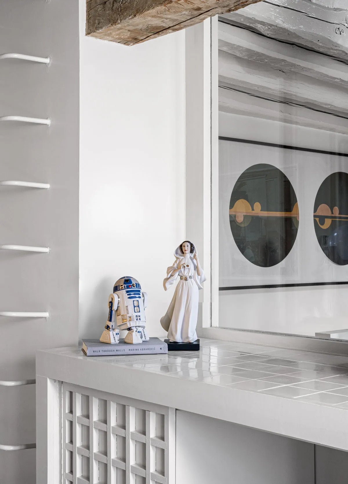 Lladro R2D2™ sculpture featuring a detailed porcelain replica of the iconic Star Wars droid with intricate craftsmanship.