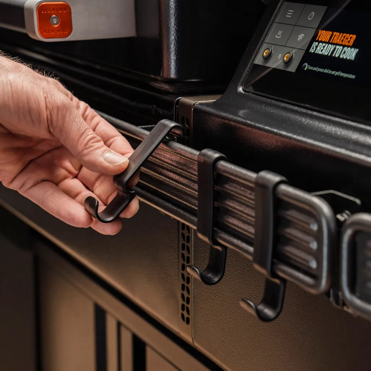 Spilhaus Treager P.A.L. POP-AND-LOCK™ accessory hooks 3-pack for grilling tools and accessories, shown on a grill surface.