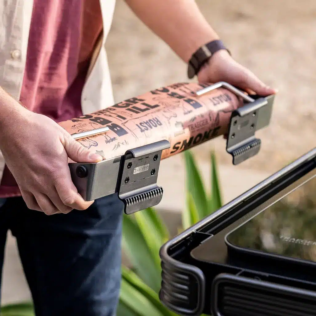 Spilhaus Treager P.A.L. Pop-and-Lock™ Roll Rack with adjustable metal bars for organized storage of grilling tools