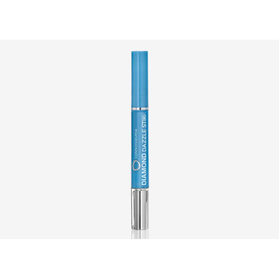 Connoisseurs Diamond Dazzle Stick cleaning and polishing tool with a blue cap and white body for jewelry and gemstone care.