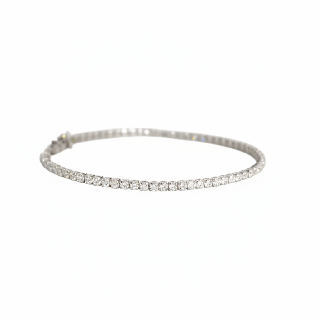 Lab Grown Diamonds 9CT white gold tennis bracelet with 1.25CT lab-grown diamonds, elegant jewelry piece on a display.
