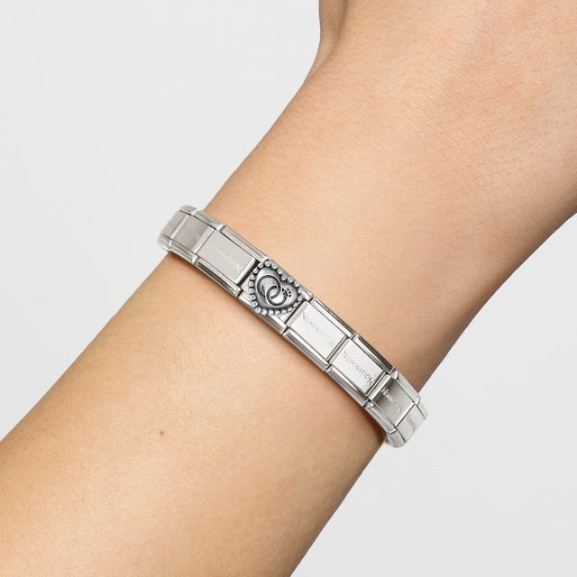 Nomination Composable Wedding Rings Heart with Dots Symbol, silver-colored jewelry featuring heart and dotted design elements.