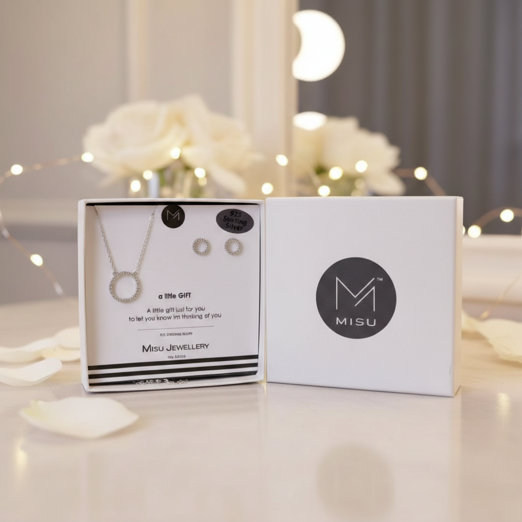 Misu sterling silver circle earrings and necklace set with matching minimalist jewelry featuring simple hoop designs.