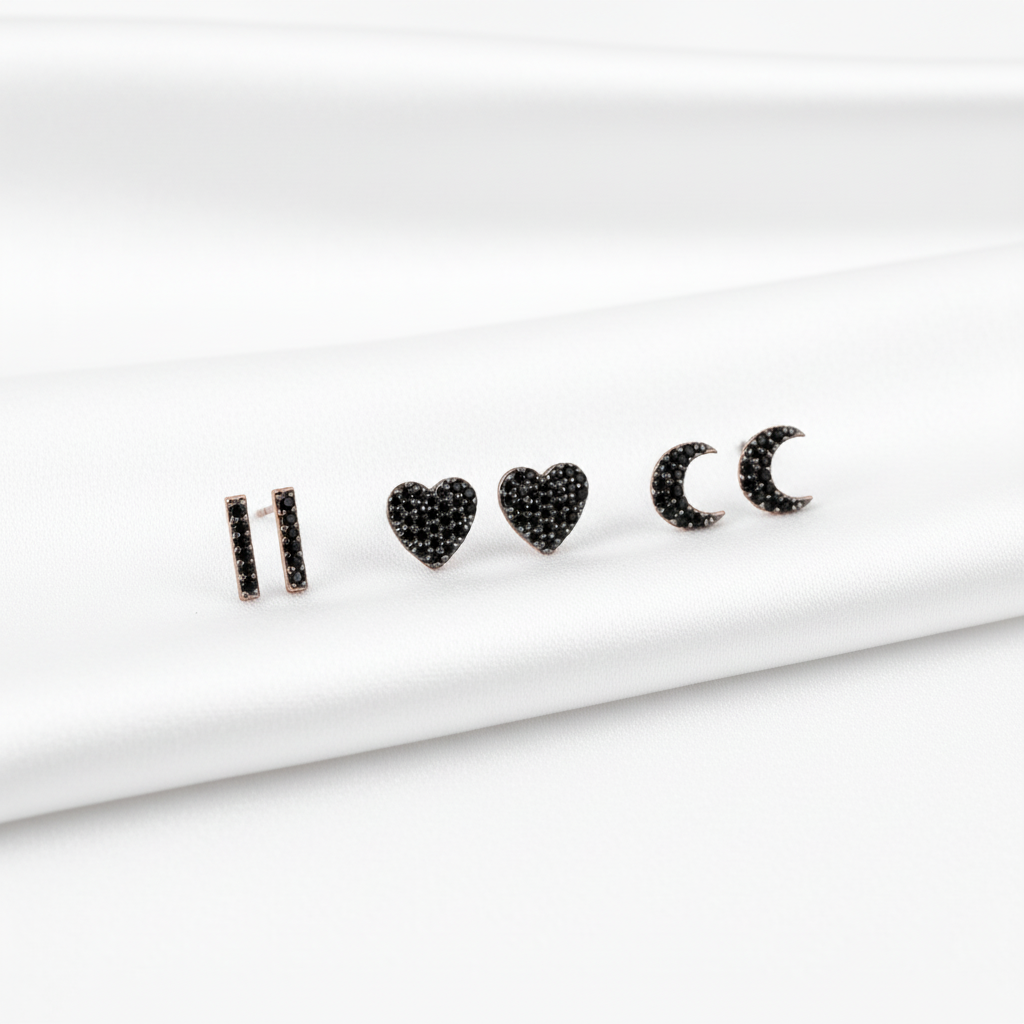 Set of three MISU 925 sterling silver midnight stud earrings featuring elegant, minimalist designs for women.