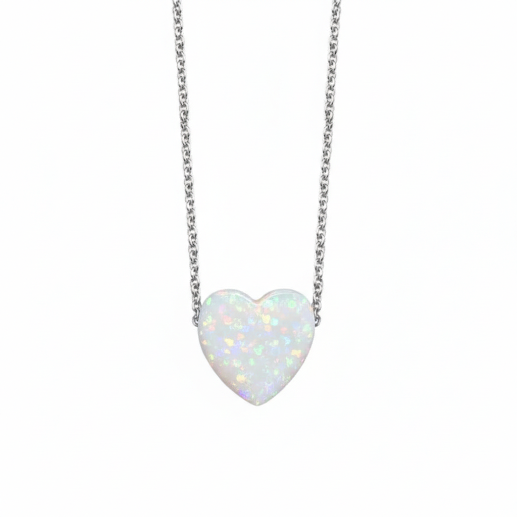 MISU sterling silver necklace with white opal heart pendant, showcasing elegant jewelry design in the image.