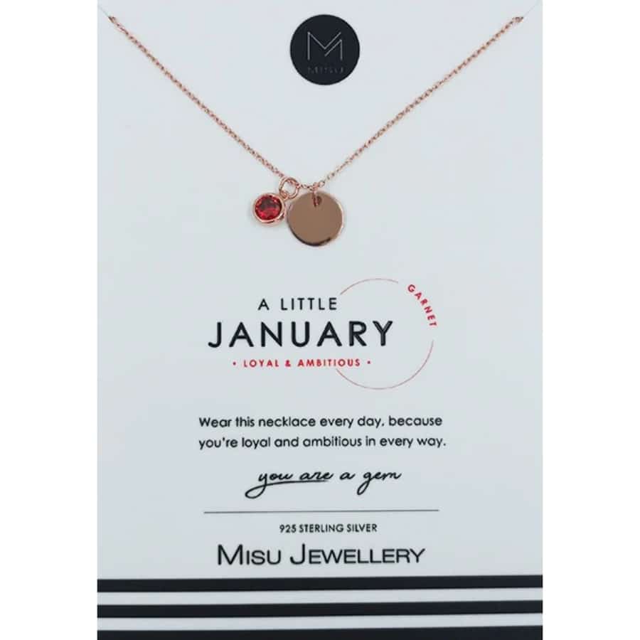 Misu rose gold birth month necklace featuring garnet gemstone for January, delicate jewelry with engraved design.