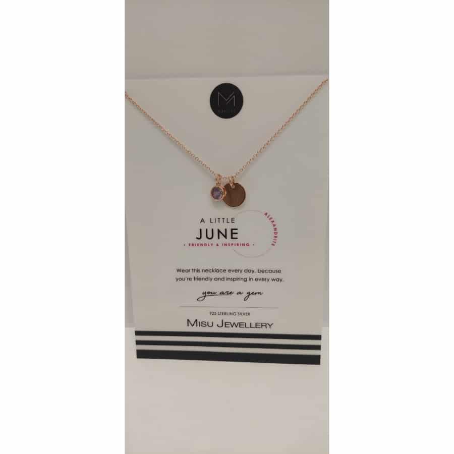 Misu rose gold necklace featuring a June birth month moonstone pendant with intricate design and delicate chain.