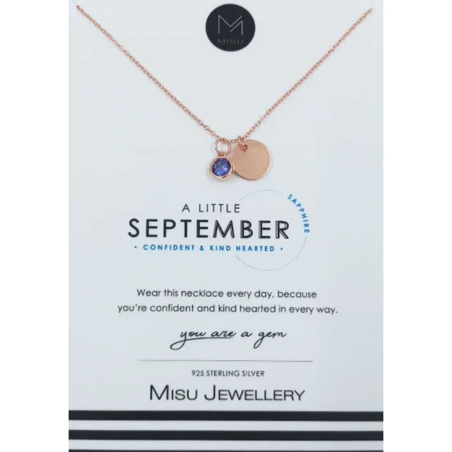 Misu rose gold necklace featuring a sapphire birthstone for September, elegant jewelry with a delicate chain and gemstone pendant.