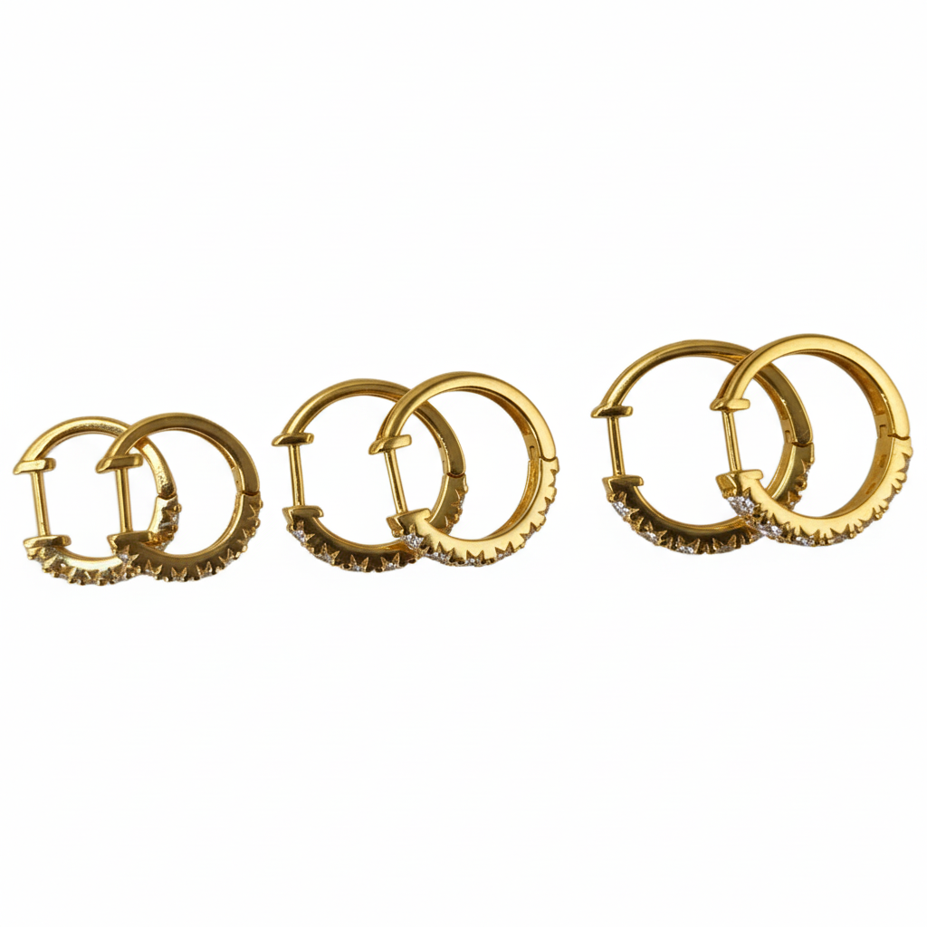 Lab Grown Diamonds 9CT yellow gold huggie earrings showcasing sparkling diamond accents and polished gold finish.