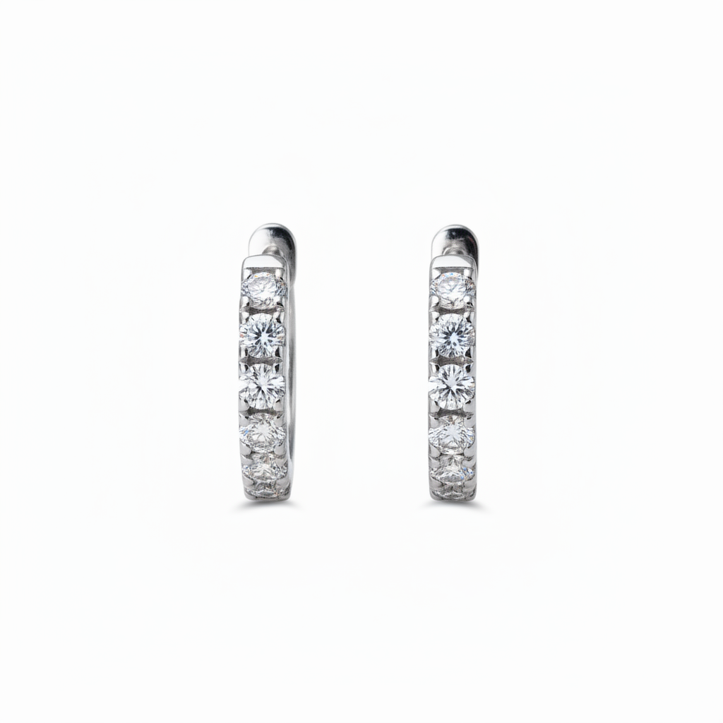 Lab Grown Diamonds 9CT white gold huggie earrings, close-up view showing the sparkling diamond design and secure clasp.