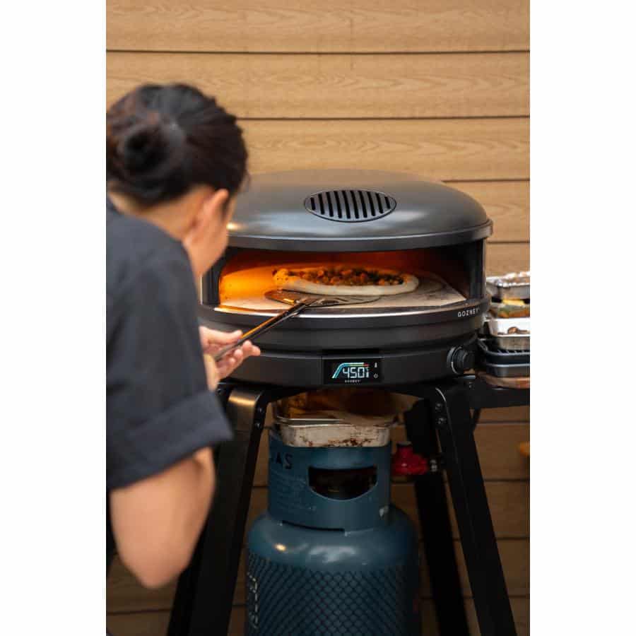 Gozney Arc XL off black outdoor pizza oven with sleek design and large cooking surface for outdoor pizza making.