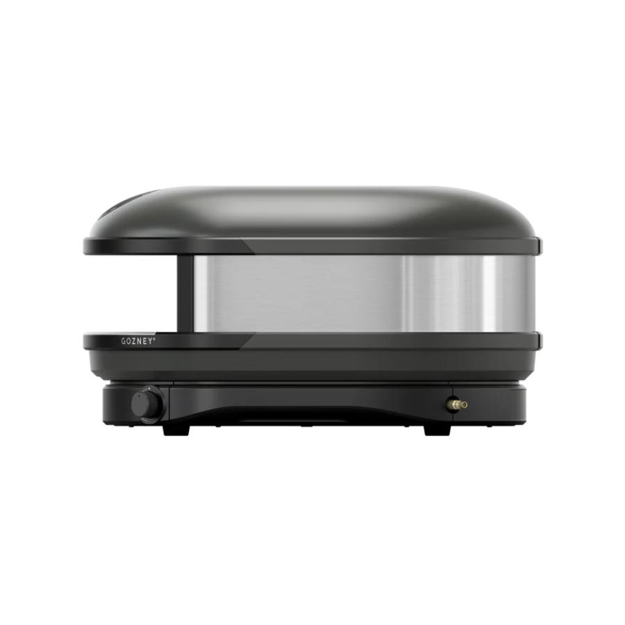 Gozney Arc XL Off Black outdoor pizza oven with sleek black exterior and large cooking surface.