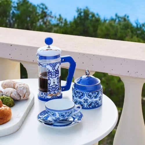 Blue Dolce and Gabbana coffee press 350ml by Bialetti, with a stylish Mediterranean design and glass carafe.