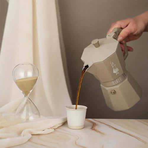 Bialetti Moka Exclusive Induction 6-cup dessert coffee maker with sleek stainless steel design and ergonomic handle.