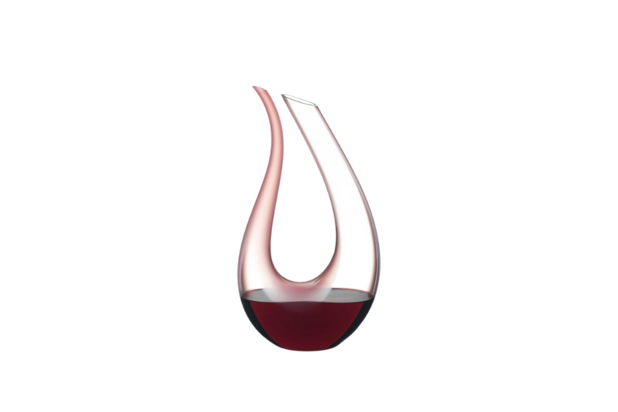 Riedel Amadeo Rosa glass decanter with elegant curved design and clear glass finish, ideal for wine presentation and aeration.