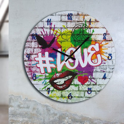 Round Gilde wall clock featuring a colorful love graffiti motif on MDF surface with bold, vibrant design.