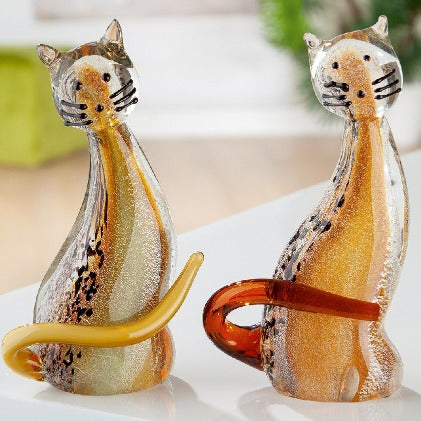 Orange Gilde Glassart cat figure with a detailed glass sculpt and prominent tail, showcasing craftsmanship and vibrant color.