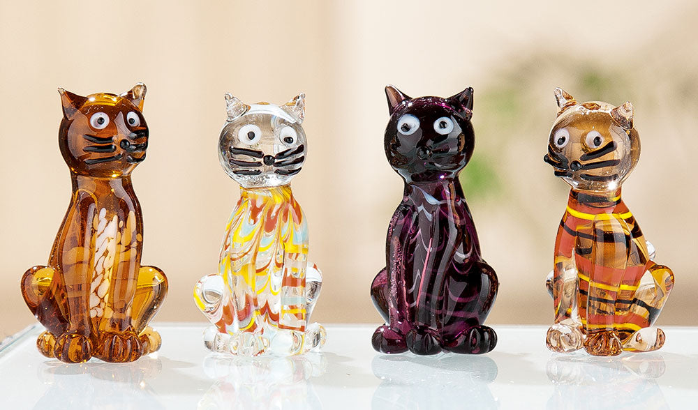 Small Gilde Lou glass cat figurine with clear, transparent design, showcasing detailed feline features and smooth glass surface.