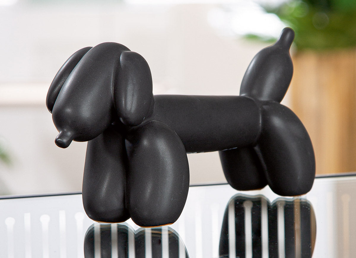 Gilde Dachshund Waldi Balloon Dog figurine in black with a glossy finish, detailed features, and playful design.